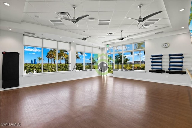 workout room with dark hardwood / wood-style floors