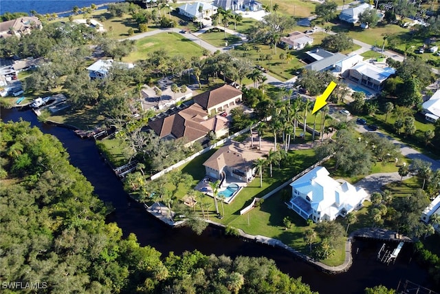 bird's eye view with a water view and a residential view