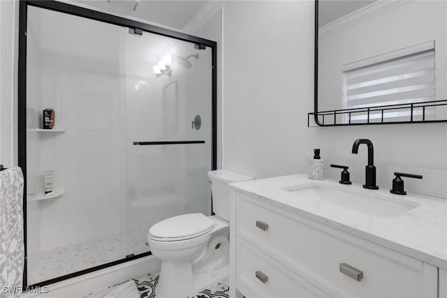 full bathroom with vanity, ornamental molding, a shower stall, and toilet