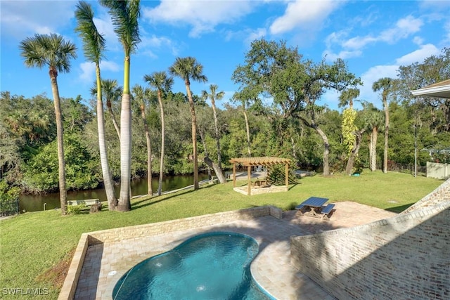 pool with a water view, a patio area, a pergola, and a lawn