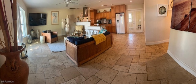 living room featuring ceiling fan