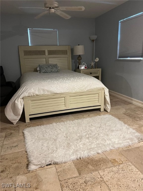 bedroom featuring ceiling fan