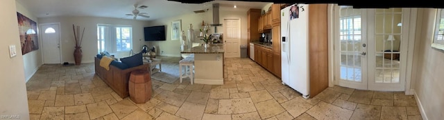 kitchen featuring ceiling fan