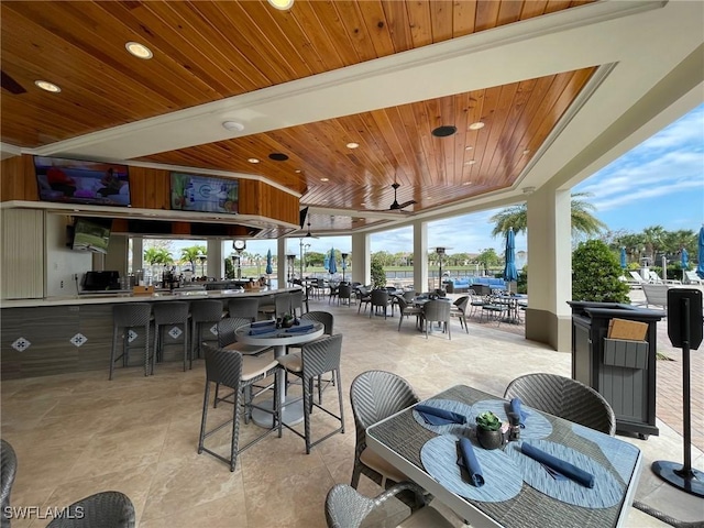 dining area featuring wooden ceiling