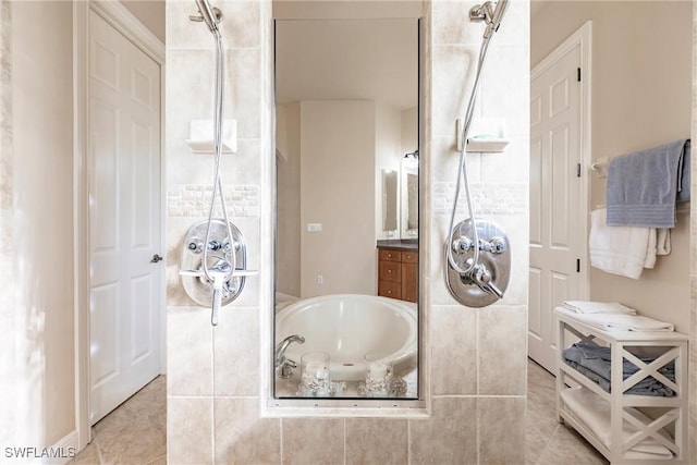 bathroom with shower with separate bathtub and tile patterned floors