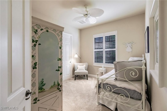 carpeted bedroom with ceiling fan