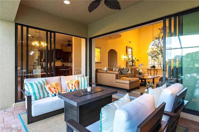 view of patio / terrace featuring ceiling fan and outdoor lounge area