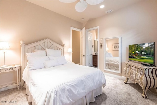 bedroom featuring light carpet, visible vents, and recessed lighting