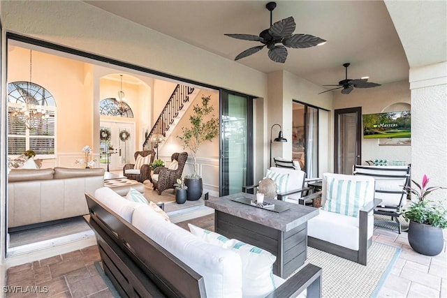 view of patio with an outdoor hangout area, ceiling fan, and french doors