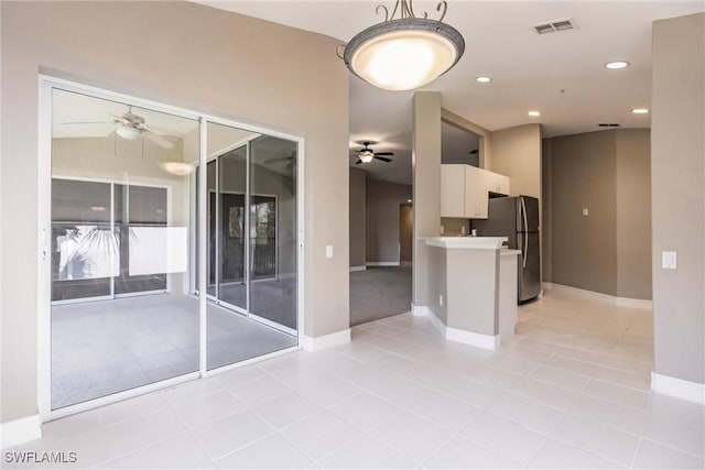 interior space with light tile patterned floors