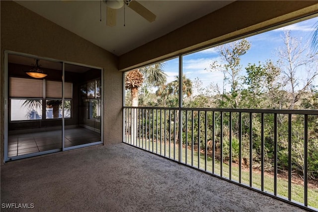 balcony featuring ceiling fan