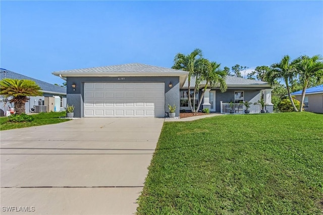 ranch-style home with a front lawn, a garage, and cooling unit