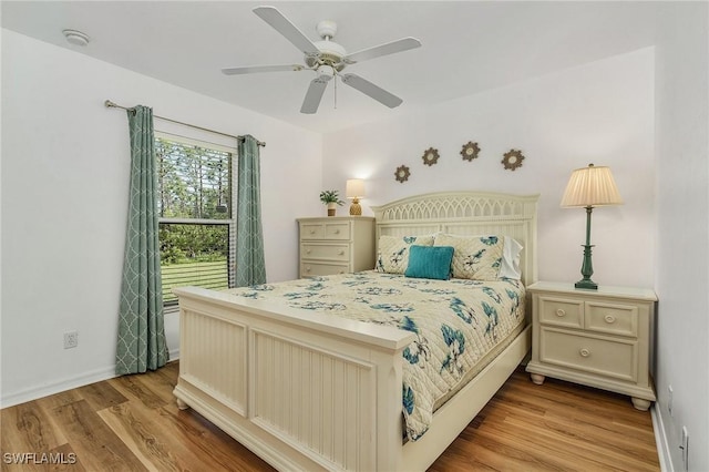 bedroom featuring ceiling fan and light hardwood / wood-style floors