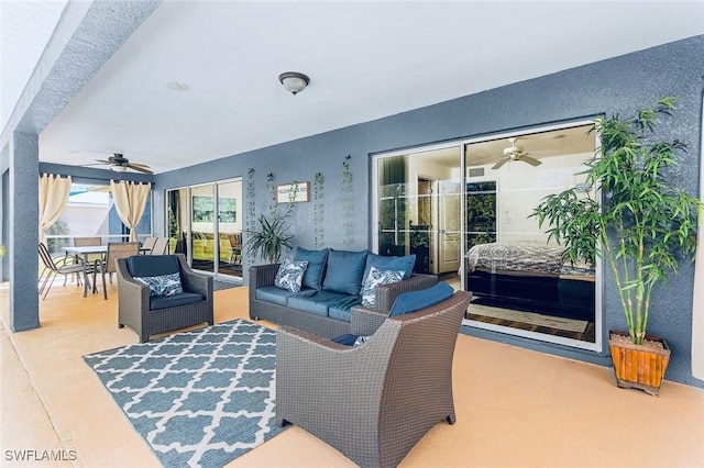 living room with carpet and ceiling fan