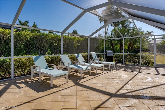 view of patio with a lanai