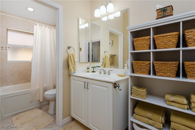 full bathroom featuring shower / bath combination with curtain, tile patterned floors, vanity, an inviting chandelier, and toilet