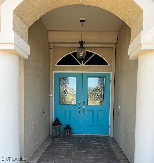 entrance to property with french doors