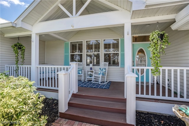 doorway to property with a porch