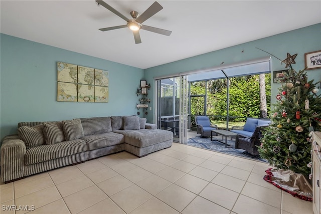 living room featuring ceiling fan and light tile patterned floors