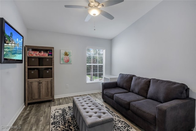 living room featuring lofted ceiling, hardwood / wood-style floors, and ceiling fan