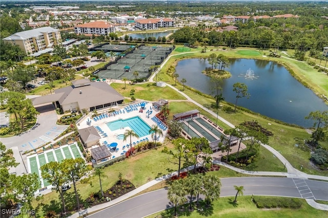 drone / aerial view with a water view