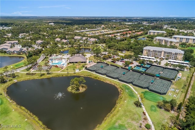 birds eye view of property with a water view