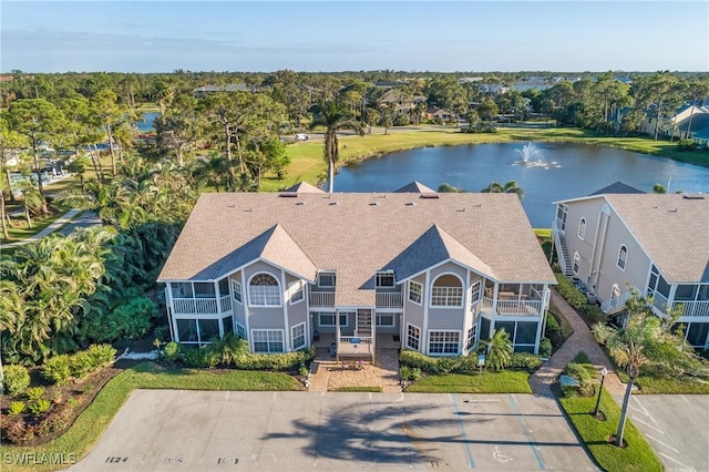 drone / aerial view with a water view