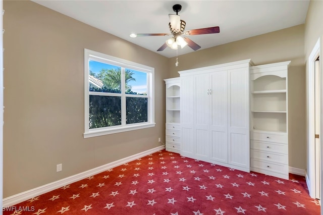 unfurnished bedroom featuring ceiling fan, carpet flooring, and a closet