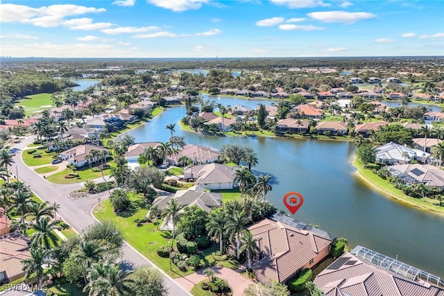 drone / aerial view with a water view