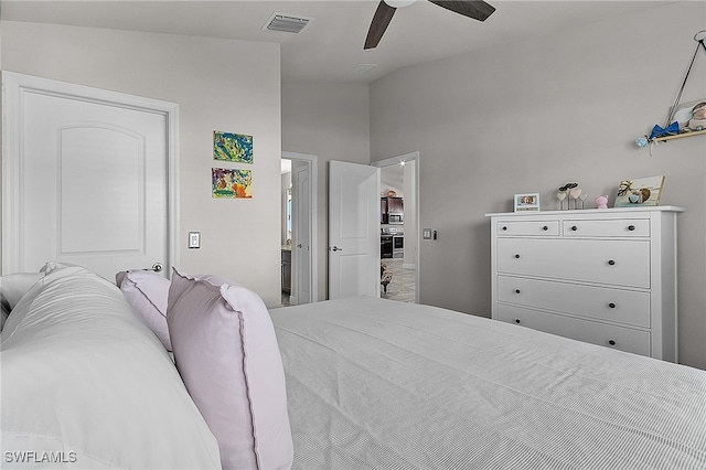 bedroom featuring ceiling fan and lofted ceiling