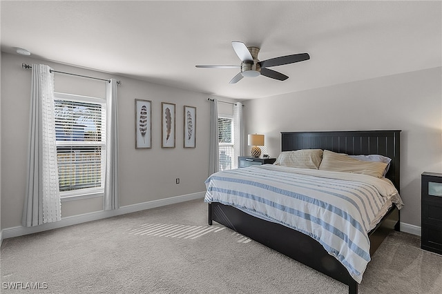 bedroom featuring ceiling fan and carpet floors