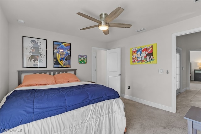 bedroom featuring light colored carpet and ceiling fan