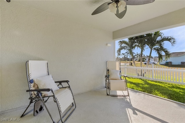 view of patio featuring ceiling fan