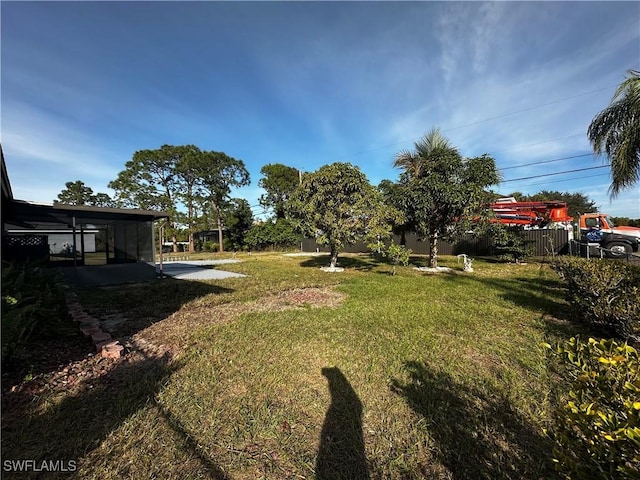 view of yard featuring a sunroom