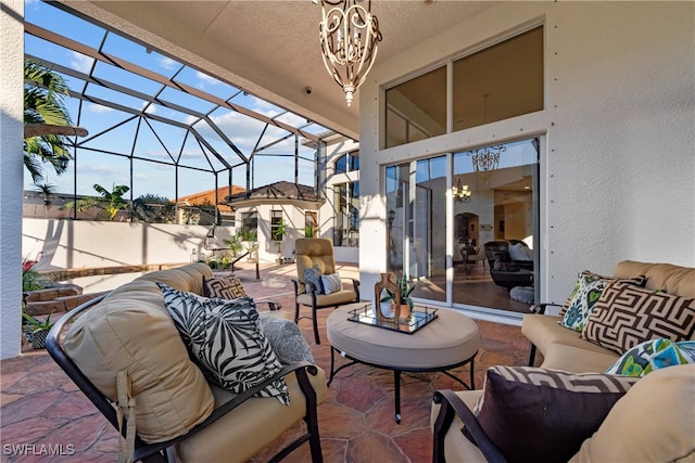 view of patio / terrace with a lanai and an outdoor living space