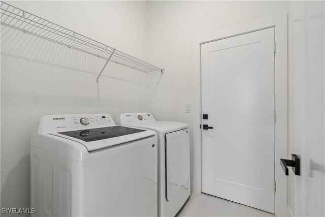 laundry area featuring washer and dryer