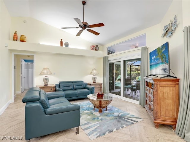 tiled living room featuring ceiling fan and vaulted ceiling