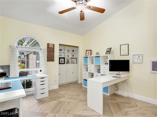 office featuring ceiling fan and lofted ceiling