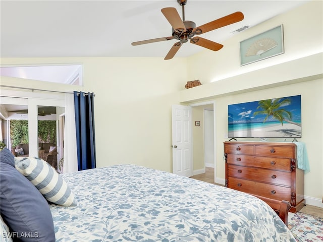 bedroom with high vaulted ceiling, ceiling fan, and access to outside