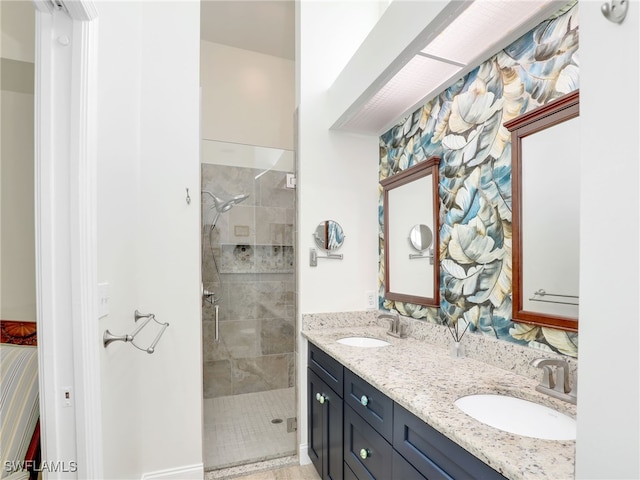 bathroom with vanity and an enclosed shower