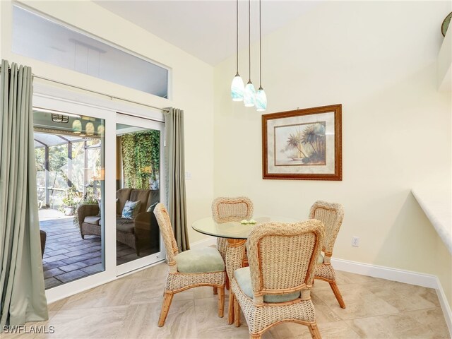 dining space with an inviting chandelier