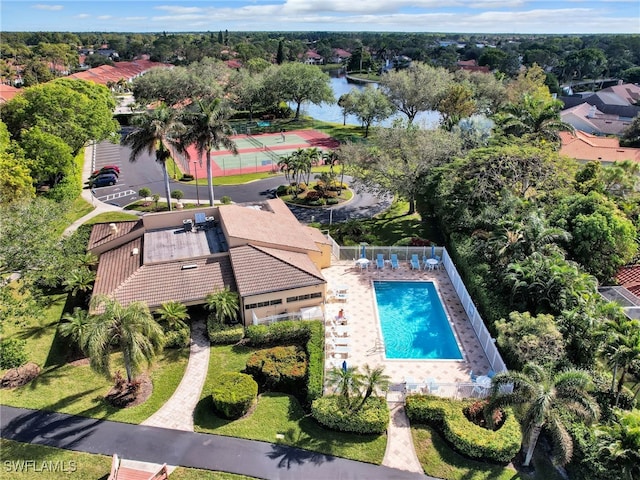 birds eye view of property featuring a water view