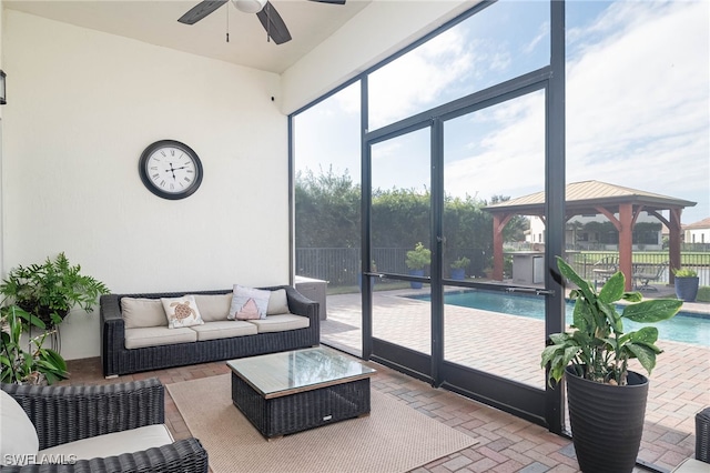 living room featuring ceiling fan