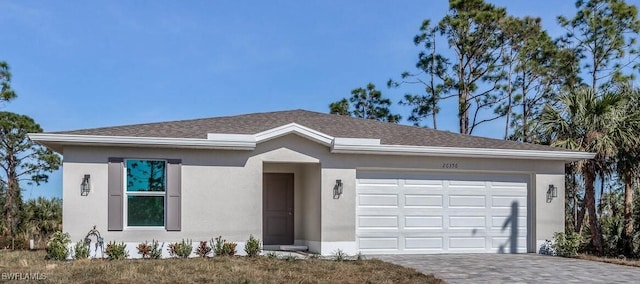 ranch-style home featuring a garage