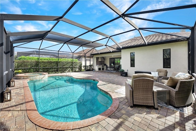 view of swimming pool with outdoor lounge area, glass enclosure, a patio area, and an in ground hot tub