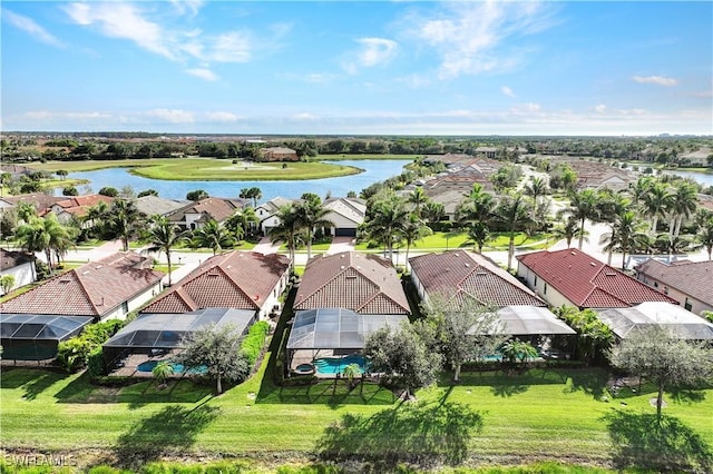 bird's eye view with a water view