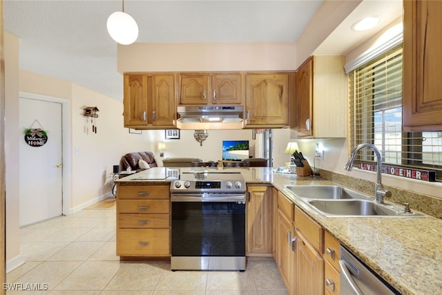 kitchen with sink, hanging light fixtures, light tile patterned flooring, kitchen peninsula, and stainless steel appliances