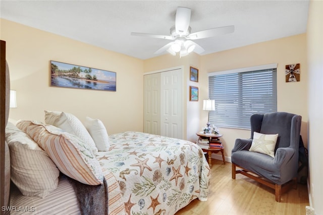 bedroom with ceiling fan, a closet, and light wood-type flooring