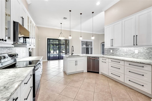 kitchen featuring white cabinetry, sink, pendant lighting, appliances with stainless steel finishes, and ornamental molding