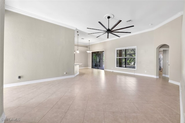 unfurnished living room featuring crown molding, ceiling fan, and light tile patterned floors